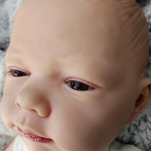 Realistic Baby Doll in Car Print Onesie